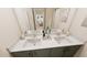 Well-lit bathroom vanity with double sinks, modern fixtures, and ample counter space for your daily routine at 3928 Willow Gate Way, Raleigh, NC 27604