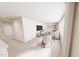 Spacious living room features neutral walls, white carpeting, stylish seating, and modern decor at 3928 Willow Gate Way, Raleigh, NC 27604