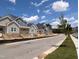Street view of modern homes under construction with sidewalks and newly planted trees at 3928 Willow Gate Way, Raleigh, NC 27604