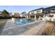 Backyard swimming pool with large patio area, perfect for outdoor relaxation and entertainment at 4329 Lambeth Dr, Raleigh, NC 27609