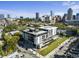 Stunning aerial view of building showing the manicured landscaping and its proximity to the city skyline at 523 S West St # 502, Raleigh, NC 27601
