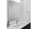 A clean powder room with updated sink and vanity, as well as sleek modern hardware at 523 S West St # 502, Raleigh, NC 27601