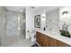 Stylish bathroom with a glass-enclosed shower and modern vanity at 523 S West St # 502, Raleigh, NC 27601