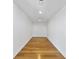 Hallway with hardwood floors and recessed lighting at 523 S West St # 502, Raleigh, NC 27601