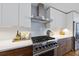 Gourmet kitchen with stainless steel appliances, white countertops and modern cabinetry at 523 S West St # 502, Raleigh, NC 27601