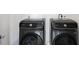 Close up view of the dark-colored Samsung washer and dryer set at 523 S West St # 502, Raleigh, NC 27601