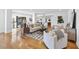 Open living room with hardwood floors, stylish decor, and view of open kitchen at 523 S West St # 502, Raleigh, NC 27601
