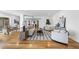 Bright living room with hardwood floors, modern furniture and open floor plan at 523 S West St # 502, Raleigh, NC 27601