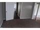 Bedroom featuring plush carpeting, doorways to other rooms, and neutral walls at 711 Weathervane Way, Rocky Mount, NC 27803