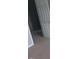 A bedroom with carpeted floors and a door leading to another room at 711 Weathervane Way, Rocky Mount, NC 27803