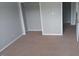Bedroom featuring a closet and carpeted floors at 711 Weathervane Way, Rocky Mount, NC 27803