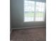 Bedroom with neutral carpet and natural light coming through a window at 711 Weathervane Way, Rocky Mount, NC 27803