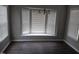 Inviting dining area with lots of light from bay windows and an overhead chandelier at 711 Weathervane Way, Rocky Mount, NC 27803