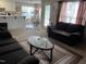 Inviting living area with a seamless transition to the kitchen, perfect for entertaining and relaxation at 711 Weathervane Way, Rocky Mount, NC 27803