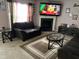 Comfortable living room with a fireplace, plush seating, and a warm, inviting atmosphere at 711 Weathervane Way, Rocky Mount, NC 27803