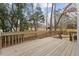 Backyard deck with a wooden fence in the background at 1010 Blackpine Ct, Knightdale, NC 27545