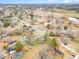 Aerial view of a neighborhood featuring small homes and mature trees at 1012 E Harnett St, Dunn, NC 28334