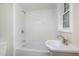Updated bathroom featuring a white subway tile shower and modern vanity at 1012 E Harnett St, Dunn, NC 28334