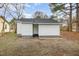 Exterior of a home featuring compact landscaping at 1012 E Harnett St, Dunn, NC 28334