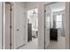 Open doorway view into bedrooms with neutral color schemes and ceiling fans at 1014 Falling Rock Pl, Durham, NC 27703