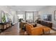 Cozy living room featuring wood floors and modern furnishings at 1014 Falling Rock Pl, Durham, NC 27703