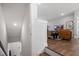 View of a living room with hard wood floors and stairs to the next level at 1014 Falling Rock Pl, Durham, NC 27703