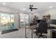 Bright office space with large windows, a ceiling fan, and natural light at 1014 Falling Rock Pl, Durham, NC 27703