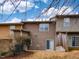 Backyard showcasing the home's exterior, with a sliding door and access to outdoor spaces at 102 Forrymast Trl, Apex, NC 27539