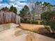 Backyard featuring a concrete patio space and a wood fence for added privacy and security at 102 Forrymast Trl, Apex, NC 27539