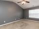 Bedroom with gray walls and bright natural light at 102 Forrymast Trl, Apex, NC 27539