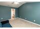 Bedroom showcasing a ceiling fan and convenient access to an en-suite bathroom for added comfort at 102 Forrymast Trl, Apex, NC 27539