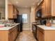 Functional kitchen with modern appliances, ample counter space, and tile backsplash at 102 Forrymast Trl, Apex, NC 27539