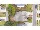 Aerial view of home with a backyard featuring a patio, fire pit, and mature trees at 1117 Golden Star Way, Wake Forest, NC 27587