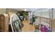 Unfinished attic storage space with plywood floor, decor, and overhead lighting at 1117 Golden Star Way, Wake Forest, NC 27587