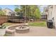 Spacious backyard with fire pit and trampoline, great for outdoor activities at 1117 Golden Star Way, Wake Forest, NC 27587