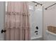 Cozy bathroom with a shower and decorative curtain, blending functionality with charming aesthetics for a comfortable experience at 1117 Golden Star Way, Wake Forest, NC 27587