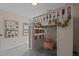 bedroom features a unique loft bed with built-in storage and cozy decor, creating a playful and inviting space at 1117 Golden Star Way, Wake Forest, NC 27587