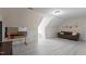 Spacious bonus room with light floors, a comfortable sofa, and ample space for activities at 1117 Golden Star Way, Wake Forest, NC 27587