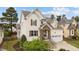 Charming two-story home with stone entryway, landscaped yard, and attached garage at 1117 Golden Star Way, Wake Forest, NC 27587