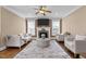 Cozy living room with a fireplace, and neutral tones at 1117 Golden Star Way, Wake Forest, NC 27587