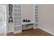 This well lit office features custom built-in bookshelves and desk for seamless organization and ample storage at 1117 Golden Star Way, Wake Forest, NC 27587