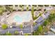 Aerial view of the community pool area featuring a playground, clubhouse, and sunning area at 1117 Golden Star Way, Wake Forest, NC 27587