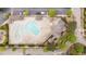Aerial view of the community pool featuring a winding pool, sunning area and clubhouse at 1117 Golden Star Way, Wake Forest, NC 27587