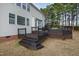 View of the backyard deck from the yard, showing access to the home at 1122 Virginia Water Dr, Rolesville, NC 27571