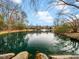 Pond view featuring a fountain and landscaping at 1213 Red Beech Ct, Raleigh, NC 27614