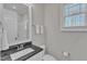 Bright bathroom features a vanity, toilet, and mirror at 1421 Sweetclover Dr, Wake Forest, NC 27587