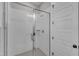 A glass enclosed walk-in shower with white subway tile and tile flooring at 1421 Sweetclover Dr, Wake Forest, NC 27587