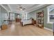 Large bedroom features windows, a ceiling fan, and room for a home office at 1421 Sweetclover Dr, Wake Forest, NC 27587