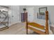 Bright bedroom features hardwood floors, a full size bed, and ensuite access at 1421 Sweetclover Dr, Wake Forest, NC 27587