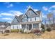 Inviting two-story home with a covered porch and established landscaping in a friendly neighborhood at 1421 Sweetclover Dr, Wake Forest, NC 27587